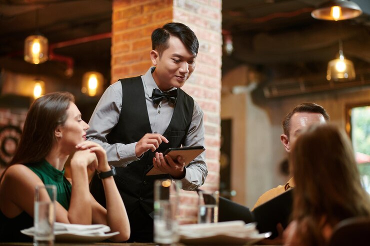 6834c882c0c3a_waiter taking order_274689 40606